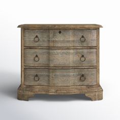 an old wooden dresser with drawers and knobs on the bottom drawer, against a white background