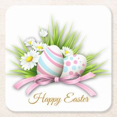 an easter card with eggs, daisies and grass on a white background stock photo