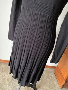 "MAXANDCLEO Beautiful Black Long Sleeve Knit Sweater Dress Size S. Sophisticated, rich-looking, sweater dress made of 50% cotton 50% rayon. Bottom-half or skirt is permanently pleated, has 2\" waistband, and beautiful scoop neckline with pleated ruffle around it. Below is BCBG's measurements for a size small. We have take a few measurements as well with the garment laying flat and unstretched. The dress is beautiful and has lots of stretch. No damage, soil, snags; may not have been worn. $39.00 Classic Fitted Long Sleeve Sweater Dress, Classic Fitted Sweater Dress, Classic Fitted Sweater Dress For Winter, Fitted Long Sweater For Work, Black Stretch Knit Sweater Dress, Black Knit Stretch Sweater Dress, Elegant Fitted Cotton Sweater, Classic Fitted Sweater Dress For Fall, Fitted Long Black Sweater Dress