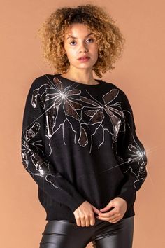 Floral Sequin Embellished Jumper from Roman. This gorgeous sparkly jumper is perfect for the party season ahead, as well as casual dressing. Emblazoned with floral sequin embellishment, it adds a subtle sparkle to any outfit. Team with denim jeggings or faux leather trousers for an everyday look that's sure to impress. Faux Leather Trousers, Casual Dressing, Sequin Embellishment, Sparkly Top, Mens Fashion Classic, Denim Jeggings, Long Sleeve Jumper, Leather Trousers, Warm Outfits