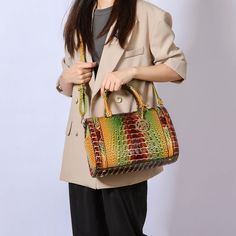 The Eleanor Satchel Bag is a stylish and trendy handbag designed for women. Its gradient rainbow faux crocodile embossed exterior is a unique design that sets it apart. It radiates both sophistication and playfulness, giving it a luxurious and exotic look. This style is designed with gold-tone embellishment. The Satchel is not just about style; it's about practicality. It features top handles and a detachable and adjustable shoulder strap, making it versatile and easy to carry, no matter the occ Trendy Handbag, Trendy Handbags, Woven Tote Bag, Open Weave, Satchel Handbags, Fabric Names, Satchel Bag, Leather Care, Satchel Bags