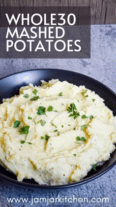 mashed potatoes in a black bowl with parsley on top and text overlay that reads whole 30 mashed potatoes