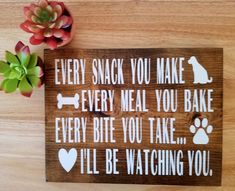 a wooden sign that says every snack you make every meal you bake every bite you take i'll'll be watching you