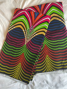 Beautiful Ankara fabric 6 yards. This is a quality Ankara print 100% cotton. Returns accepted. Cotton Fabric With Graphic Print, Patterned Cotton Fabric With Graphic Print, Cotton Fabric With Vibrant Patterned Print, Vibrant Print Cotton Fabric, Multicolor Cotton Fabric With Vibrant Print, Cotton Fabric With Vibrant Multicolor Print, Vibrant Print Patterned Cotton Fabric, Patterned Cotton Fabric With Vibrant Print, Vibrant Multicolor Cotton Fabric