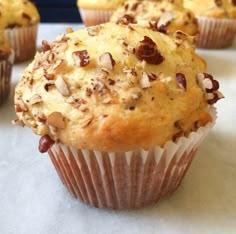 several muffins are sitting on a counter top