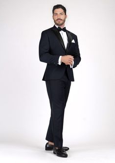 Look your best in the Dean Dark Navy Twill Tuxedo. This timeless design exudes sophistication and elegance for any formal occasion. Crafted from luxurious twill fabric, the dark navy shade adds an air of subtle class and exclusivity. Be the envy of the night in this classic, tailor-made piece. Fitted Tuxedo For Evening Gala, Luxury Fitted Tuxedo For Evening, Luxury Gala Suits For Formal Occasions, Elegant Black Evening Suits, Gala Evening Fitted Tuxedo, Elegant Tailored Tuxedo For Gala, Elegant Suits For Black-tie Gala Events, Elegant Custom Fit Suits For Evening, Elegant Evening Suits With Custom Fit