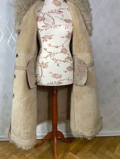 Cream Sheepskin Fur Coat For Winter, Cream Sheepskin Fur Coat With Faux Fur Trim, Cream Long Fur Coat With Faux Fur Lining, Vintage Long Beige Fur Coat, Vintage Beige Long Fur Coat, Vintage Cream Fur Coat With Faux Fur Trim, Cream Vintage Fur Coat For Winter, Vintage Cream Fur Coat For Winter, Princess Coat