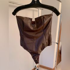 In Very Good Condition, Never Worn But No Tag. This Bodysuit Is So Soft And Looks Great With The Perfect Pair Of Jeans! Fits True To Size. Any Questions, Just Comment:) Chic Bandeau Bodysuit For Night Out, Chic Bodysuit With Boning For Night Out, Fitted Bandeau Bodysuit For Night Out, Chic Brown Tube Top For Night Out, Chic Strapless Bodysuit For Date Night, Zara Fitted Tube Top For Night Out, Strapless Brown Tube Top For Night Out, Zara Bodysuit With Lined Body For Night Out, Zara Bodysuit For Night Out