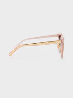 Introduce a pop of colour to your outfit with this sweet pink iteration of our recycled acetate sunglasses. Made from lightweight recycled acetate, these oversized sunnies will imbue any outfit with a bold and glamorous touch. With gradient tinted lenses as well as contrasting metallic gold-toned top rims and temples, they will protect your eyes from the glare of the sun while adding a touch of sparkle to all your looks. Cateye Sunglasses, Acetate Sunglasses, Charles Keith, Sunglasses & Glasses, Metallic Gold, Cat Eye Sunglasses, Your Eyes, Sunnies, Gold Metal