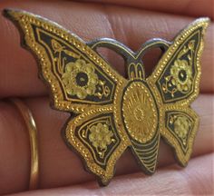 Hi there and welcome to 'In the magpie's nest' For sale - A vintage 60's damascene style butterfly shaped brooch pin black and gold insect Brooch shape - Butterfly Measurement - 3.8x2.7cm's Metal - Gold tone Decoration - Damascene style Era - 1960's -------------------------------------------------------------------------------------------------- Condition - good vintage condition - (see pics) Your brooch will come packaged in a hand decorated gift box ------------------------------------------- Gold Butterfly Brooches For Collectors, Vintage Handmade Butterfly Brooch, Handmade Vintage Butterfly Brooch, Festoon Necklace, Insect Brooch, Shape Butterfly, Exotic Bird, Toned Abs, Owl Pendant