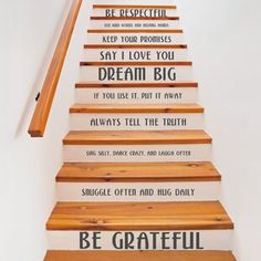 the stairs are painted with words on them and have been designed to look like they're