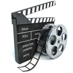 an old fashioned movie reel and clapsticks on white background stock photo - image