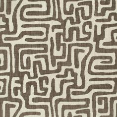 a brown and white pattern on fabric