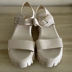 Fashion Nova Platform Sandals With Velcro Buckle Color: Off-White Size: U.S.- 8.5. Uk- 39 Condition: Brand New Platform Height: 2 Inches White Synthetic Wedge Sandals With Buckle Closure, White Wedge Sandals With Ankle Strap And Buckle Closure, White Sandals With Buckle Closure For Spring, White Ankle Strap Wedge Sandals With Buckle Closure, White Casual Wedge Sandals With Buckle Closure, White Wedge Sandals With Buckle Closure And Open Heel, White Open Toe Sandals With Buckle Closure, White Open Heel Wedge Sandals With Buckle Closure, Trendy White Sandals With Buckle Closure