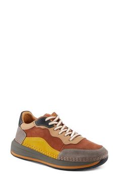 This sporty sneaker is topped with colorblocked leather and grounded on an exaggerated sole. 1 1/2" heel; 1" platform Lace-up style Removable, cushioned insole with arch support Leather upper and lining/synthetic sole Made in Turkey Leather Sneakers With Lug Sole For Sports, Leather Sneakers With Lug Sole, Trendy Leather High-top Sneakers With Contrast Sole, Brown Platform Sneakers With Contrast Sole And Round Toe, Multicolor Platform Sneakers With Contrast Sole For Streetwear, Sporty Leather High-top Sneakers With Lug Sole, Leather Platform Sneakers With White Vibram Sole, White Leather Platform Sneakers With Vibram Sole, Modern Suede Platform Sneakers With Contrast Sole