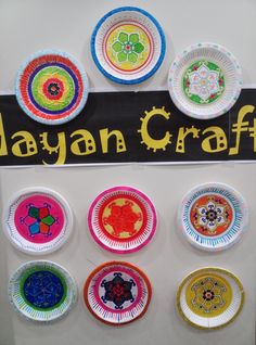 there is a sign that says maynan craft on the wall with many different designs