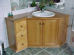 a bathroom with a sink, mirror and bathtub