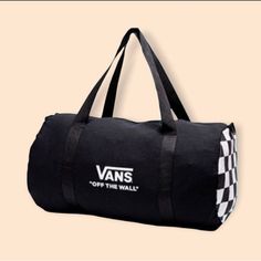 Vans Checkerboard Skate Duffle Bag Black Large Heavy-Duty Duffel Bag With Durable Zipper. Roomy With Vans Logo Printed On The Side. Also Features An Adjustable Shoulder Strap. Vans Family Exclusive Off The Wall Logo Black With Black/White Checker Ends 19" X 10" X 10" Cotton Canvas Shell Polyester Lining White Vans Bags, White Casual Duffle Bag With Adjustable Strap, Casual White Duffle Bag With Adjustable Strap, White Casual Travel Bag With Zipper Closure, Casual White Travel Bag With Zipper Closure, Vans Rectangular Bag For Daily Use, Vans Rectangular Bag For Everyday, Vans Casual Bag With Adjustable Strap, Casual Vans Bag With Adjustable Strap