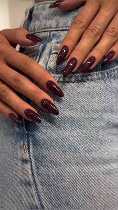 Get festive with these classic red and white candy cane nails featuring a stunning glitter accent! The traditional stripes shine brightly with an eye-catching glitter finish on the accent nails, making your manicure pop while keeping it chic and stylish. Perfect for holiday parties or cozy gatherings, these nails are a sweet way to celebrate the season! 🎄✨💅 #NailArt #CandyCaneNails #GlitterNails #ChristmasNailDesigns #HolidayNailInspo  .. Wine Colored Acrylic Nails, Dark Cherry Mocha Nails, Maroon Nails Gel, Almond Cherry Mocha Nails, Super Dark Red Nails, Red Nails November, Deep Cranberry Nails, Red Nail Inspo Design, Oxblood Nails Acrylic