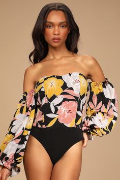 Give your 'fit some flair with the Lulus Bring the Blossom Black Floral Print Off-the-Shoulder Bodysuit! Marigold, pink, and grey floral print sweeps across lightweight woven fabric as it shapes an off-the-shoulder neckline (with hidden no-slip strips) and long sleeves with ruffle, elasticized cuffs. A seamed bodice carries into stretch knit thong bottoms with double snap closures. Length: Size small measures 23" from top to bottom. Fabric: Fabric has no stretch. Unlined. Shell: 100% Polyester. Floral Print Off-shoulder Top For Spring Vacation, Off-shoulder Floral Print Crop Top For Spring, Casual Floral Print Off-shoulder Top, Fitted Off-shoulder Floral Print Top, Beachwear Floral Print V-neck Bodysuit, Adhesive Bra, Strapless Bra, Grey Floral, Black Floral