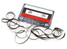 an old fashioned cassette tape with eyeglasses on white background stock photo - 9579