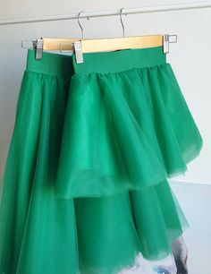 "❤ MADE ESPECIALLY FOR YOU Our kelly green tulle skirts are made to order to your specific measurements. Please check chart size before placing your order or contact me for any detail. ❤ MATCHING SETS The listing is for a matching set with your daughter, so you will receive two tulle skirts. ❤ DETAILS -> fully SEWN tutus, they are NOT tied or knotted -> soft tulle fabric -> lining silk saten -> elastic waistband -> 6 layers of tulle, plus lining -> not see through Manual wash 4 Green Summer Wedding Skirt, Green Ruffled Party Skirt, Green Ruffled Skirt For Party, Green Full Skirt With Ruffles, Spring Green Tulle Skirt, Green Tiered Tulle Skirt, Green Tulle Skirt For Party, Green Ruffled Skirt, Fitted Green Tulle Skirt