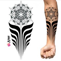 an arm tattoo is shown with intricate designs on the arm and wrist, as well as a