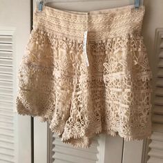 Blue Island Nwt Natural Lined Crochet Cover Up Shorts. Wide Elastic Waist. Very Pretty Crochet. Could Easily Be Used As Shorts. Size Large. Casual Summer Bottoms With Lace Patchwork, Casual Lace Patchwork Bottoms For Summer, Fitted Crochet Lace Bottoms For Vacation, Casual Spring Bottoms With Crochet Lace, Beige Lace Bottoms For Spring, Fitted Beige Bottoms With Crochet Trim, Spring Lace Beige Bottoms, Spring Beige Lace Bottoms, Summer Festival Bottoms With Crochet Lace