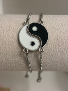 These unique friendship or couples matching bracelets are the perfect gift for your best friend or significant other! Yin and Yang. / (jɪn) / noun. two complementary principles of Chinese philosophy: Yin is negative, dark, and feminine, Yang positive, bright, and masculine. Their interaction is thought to maintain the harmony of the universe and to influence everything within it. Matching Gifts For Friends, Nickel-free Silver Friendship Bracelet, Casual Adjustable Chain Jewelry For Friendship, Silver Spiritual Friendship Bracelets, White Sterling Silver Friendship Bracelets, Trendy Silver Hypoallergenic Friendship Bracelets, Trendy Hypoallergenic Silver Friendship Bracelets, Silver Adjustable Friendship Bracelets, Trendy Personalized Silver Friendship Bracelets