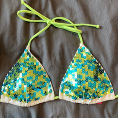 Nwot Victoria’s Secret Blue And Neon Green Sequin Triangle Bikini Top. Neck And Back Ties. Size Medium. Sequin Swimwear For Summer Vacation, Summer Vacation Sequined Swimwear, Green Fitted Swimwear For Festivals, Beachwear Triangle Top For Parties, Sequin Beachwear Swimwear For Summer, Victoria's Secret Summer Beach Top, Summer Poolside Sequin Swimwear, Beach Sequined Stretch Tops, Fitted Sequined Swimwear For Beach