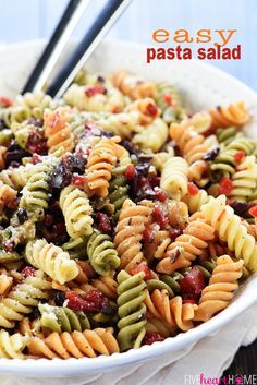 pasta salad in a white bowl with black chopsticks on the side and text overlay that reads easy pasta salad