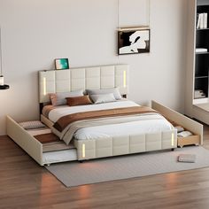 a bedroom with a bed, nightstands and bookshelf