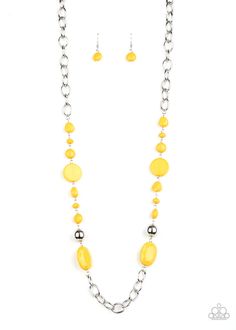 Varying in size and shape, flat and faceted yellow beads link with a pair of classic silver beads along sections of bold silver links, coalescing into a colorful display across the chest. Features an adjustable clasp closure. Hanging Necklaces, Yellow Necklace, Costume Jewelry Necklaces, Paparazzi Accessories, Paparazzi Jewelry, Boutique Jewelry, Bling Jewelry, Necklace Earring Set, Faceted Bead