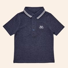 The Andre polo shirt is comfortable enough to play in all day but can also be worn for perhaps one of life’s dressier moments - think school picture day or brunch with grandma. The Andre polo shirt is made from our super soft pique knit and features a classic rib collar and cute embroidery at the chest. 93% Organic Cotton, 2% Recycled Polyester, 5% Spandex Turquoise Watch Band, School Picture Day, School Picture, Red Backpack, Tennis Shirts, Cute Graphic Tees, Cute Embroidery, Picture Day, Cute Blouses