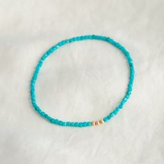 D E T A I L S △ Handmade in Vanoucver △ Unique cube shaped genuine turquoise △ 100% genuine turquoise △ Durable, high quality elastic △ 14K gold filled components S I Z I N G Measure wrist and add 1/2" to determine bracelet size ♡ Q U A L I T Y  The upmost quality and care goes into sourcing each and every material I use. Gemstones are sourced from Jaipur and Rishikesh, India and I hold stronger connections to my suppliers. I use 100% authentic gemstones, this is our guarantee (no synthetics or imitation stones).  HANDMADE with love and care by me in my studio in Halifax, NS (Canada) △View my entire shop here: www.etsy.com/ca/shop/EarthlyAbundanceGems △Shop our entire turquoise collection here: https://www.etsy.com/ca/shop/EarthlyAbundanceGems?ref=simple-shop-header-name&listing_id=6988592 Turquoise Beaded Bracelets For Everyday Wear, Everyday Turquoise Beaded Bracelets, Everyday Turquoise Beaded Bracelet, Turquoise Beaded Bracelets With Tiny Beads, Turquoise Beaded Bracelet With Spacer Beads, Turquoise Beaded Bracelets With Spacer Beads For Everyday, Everyday Hand-strung Turquoise Jewelry, Everyday Turquoise Hand-strung Jewelry, Dainty Hand-strung Turquoise Jewelry