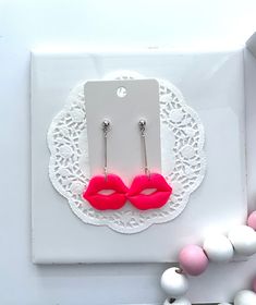 Lip glossy dangles are sure to get noticed! Listing includes: 1 pair of lip dangles. Select a color option during checkout. (Hot pink or red)   Please allow for slight differences in the final product due to different screen resolutions on phones, computers, tablets, etc. Thank you in advance for understanding.  NO RETURNS OR EXCHANGES ACCEPTED AT THIS TIME. Playful Pink Earrings For Party, Trendy Pink Dangle Earrings, Modern Pink Dangle Earrings, Trendy Pink Hypoallergenic Earrings, Trendy Hypoallergenic Pink Earrings, Jewelry Earrings Dangle, Hot Pink, Dangle Earrings, Jewelry Earrings