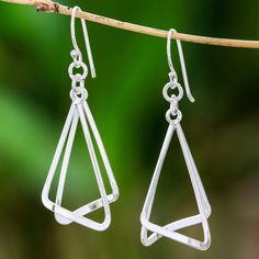 Inspired by the wings of butterflies, Thai artisans craft these dangle earrings from high-polish sterling silver triangles. Pichaya presents this modern accessory. Artsy Nickel-free Dangle Jewelry, Art Deco Sterling Silver Dangle Jewelry, Nickel Free Triangle Sterling Silver Earrings, Elegant Triangle Sterling Silver Earrings, Fun And Easy Diys, Nickel-free Triangle Sterling Silver Earrings, Modern Accessories, Sterling Silver Dangle Earrings, Artisan Craft