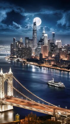 the city skyline is lit up at night, and there are boats in the water below