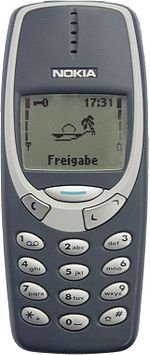 an old nokia cell phone is shown in this image