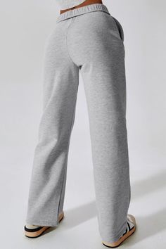 Look and feel your best in our straight leg high waisted sweatpants. Made with a soft and comfortable fabric, these pants are perfect for any occasion, from running errands to lounging at home. The high waist provides a flattering fit, while the straight leg silhouette elongates your figure. Available in three versatile colors, these sweatpants are sure to become a staple in your wardrobe. Features: High waisted for a flattering fit Straight leg silhouette elongates the figure Soft and comfortab Sporty Full-length Bottoms For Lounging, Stretch Wide-leg Athleisure Joggers, Fall Athleisure Pants With Straight Hem, Trendy Wide Leg Workout Pants, Trendy Joggers For Lounging, Sporty Straight Lounge Pants, Sporty Straight Lounging Pants, Sporty Straight Pants For Lounging, Sporty Lounging Pants