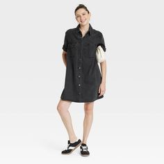 Spruce up your casualwear collection with this Short-Sleeve Mini Shirtdress from Universal Thread™. The short-sleeve shirtdress is made from midweight denim fabric for a breathable fit, while the collared neckline with front button-down closure provides ease of wear. It sports a double-stitched seam, pleated back, front placket and a back yoke for a smart look that's perfect for a variety of occasions. The flap chest pocket completes the design with functional flair. Universal Thread™: Found exc Casual Half Sleeve Shirt Dress With Button Closure, Short Sleeve Relaxed Fit Shirt Dress With Button Closure, Relaxed Fit Short Sleeve Shirt Dress With Button Closure, Oversized Short Sleeve Shirt Dress For Day Out, Summer Cotton Shirt Dress With Rolled Sleeves, Casual Half Sleeve Shirt Dress, Relaxed Fit Collared Shirt Dress With Pockets, Casual Half Sleeve Relaxed Shirt Dress, Casual Half Sleeve Relaxed Fit Shirt Dress