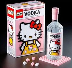 a hello kitty vodka bottle next to some legos