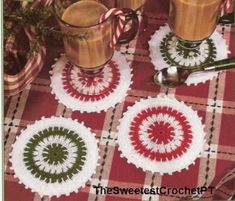 crocheted coasters on a table with coffee