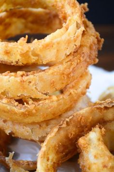 fried onion rings piled on top of each other