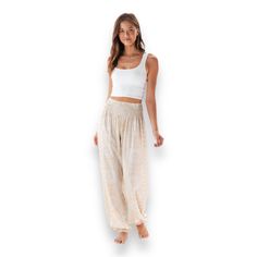 Nwt Lotus And Luna Sahara Harem Pants L/Xl Feel Free In The Comfiest Pants On Earth! Featuring Our Buttery Soft Fabric, And Lotus And Luna's Signature Smocked Waistband, These Pants Are Perfect For Lounging! Lightweight And Quick To Dry, These Pants Will Have Your Back On Your Next Beach Vacation. Handmade In Thailand; Each Pair Comes With The Photo And Story Of The Artisan Who Created It. Lotus And Luna Empowers Artisan Communities In Northern Thailand Through Educational Resources, Fair Wages, Northern Thailand, Comfy Pants, Your Back, Educational Resources, On Earth, Bottoms Pants, Beach Vacation, Soft Fabric, Smocking