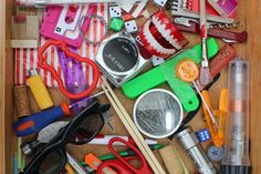 a wooden box filled with lots of crafting supplies