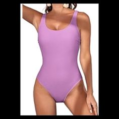 Purple One Piece Swimsuit. Please Read Little Girl Swimsuit. Very Cute For The Beach Or A Pool Very Comfortable. The Colors Are Really Poppin. The Swimsuit Is Adorable. This Is The Sales Price At This Time. I Will Be Changing It When Vacation Season Is Over. It Will Be Priced Back To Its Original Price. No Offer For Less. Not Even If You Put Them In A Bundle They Already Have A Great Sales Price And In Great Condition No Flaws No Tears No Rips No Stain. This Swimsuit Is Timeless. Price $35.00 Si Summer Swimming Bodysuit In Purple, Summer Purple Swimming Bodysuit, Solid Sleeveless One Piece For Sunbathing, Purple Sleeveless One Piece For Vacation, Purple Sleeveless Bodysuit For Vacation, Sleeveless Purple One Piece For Vacation, Purple Sleeveless One-piece For Vacation, Solid Sleeveless One-piece For Sunbathing, Sleeveless Solid One-piece For Sunbathing