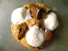 a cookie with marshmallows and chocolate on top