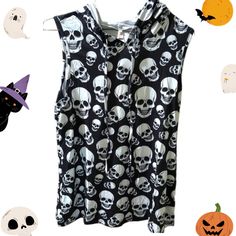 Nwt Sleeveless Hooded Skull Tee Shirt. Size Medium. Black And White Allover Skull Print. Hooded With Drawstring, Sleeveless. Lightweight. 65% Cotton Your 35% Polyester Approximate Measurements Pit To Pit 18” Length 27” Sleeveless Skull Print Top For Summer, Sleeveless Summer Top With Skull Print, Black Cotton Tank Top With Skull Print, Halloween Sleeveless Vest Top, Casual Skull Print Tank Top For Streetwear, Cotton Skull Print Sleeveless Tank Top, Casual Halloween Skull Print Tank Top, Cotton Sleeveless Tank Top With Skull Print, Casual Halloween Vest Top