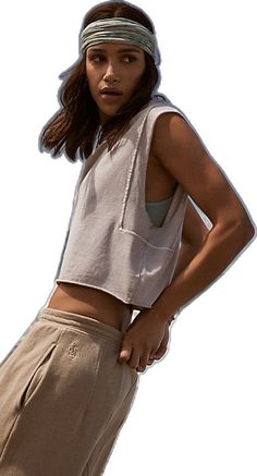 Cropped Athleisure Tank Top For Everyday, Everyday Cropped Athleisure Tank Top, Casual Sleeveless Crop Top For Everyday, Casual Everyday Sleeveless Crop Top, Relaxed Fit Sleeveless Crop Top, Sporty Relaxed Fit Cropped Top, Casual Cropped Tank Top For Everyday, Casual Slightly Cropped Tank Top For Spring, Casual Tank Top With Relaxed Fit And Dropped Armholes